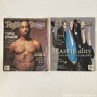 Two magazines laid flat showing Tupac Shakur and Beastie Boys covers.