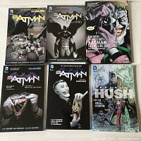 Front covers of six Batman graphic novels including volumes 1, 2, 3, 7 of New 52, Batman Hush, and Batman The Killing Joke deluxe edition.
