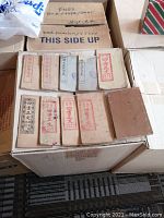 12 vintage Chinese language books set in a box, varying cover colors and visible wear consistent with age.