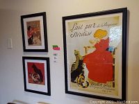 Three cat-themed art prints framed and hanging on a wall showing size and overall composition.