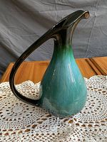 Side view of Blue Mountain Pottery jug showing shape, glaze colors, and large handle