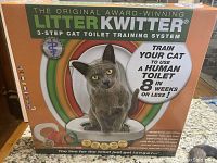 Front of box showing branding, cat image and main features such as 3-step system and training goal (8 weeks or less).