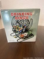 Box of Drinking Bingo game showing text and image of the item.