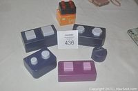 Seven various Creative Memories scrapbooking stamps shown including circles, squares, octagons, and Halloween-themed stamps in multiple colors and sizes.