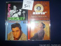Front view of four Elvis Presley CD jewel cases with cover art.