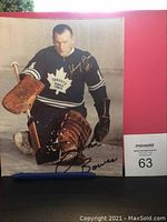 Full view of the Johnny Bower autographed photo showing him in goalie gear.