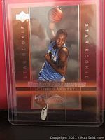 Front view of Carmelo Anthony Upper Deck Star Rookie basketball card in protective casing showing card details and player image.