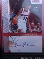 Front view of Richard Hamilton 1999-2000 Stadium Club basketball card with autograph and visible on-card signature.