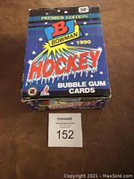 Blue box of 1990 Bowman Premier Edition Hockey Bubble Gum Cards, front and side view.