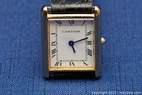 Front close-up showing dial, hands and Cartier logo