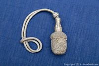 Close-up of the woven knot and loop on blue background