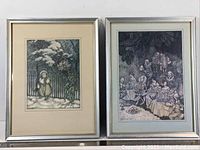 Two framed prints side by side showing two different Arthur Rackham fairy-themed illustrations in silver frames.