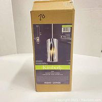 Photo of the product box with front label showing Kimberly pendant lamp by Canarm with chrome metal coating.