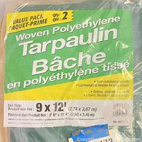Packaging label showing 'Woven Polyethylene Tarpaulin' with dimensions and features information, quantity indicated as 2.