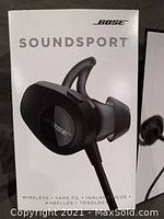 Close-up photo of Bose Soundsport wireless headphones box front showing product image and logo.