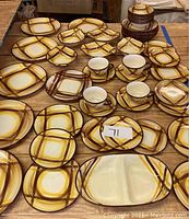 Full layout of Vernonware California dinnerware including plates, bowls, cups, and divided dish showing pattern and quantity