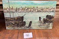 Full view of the oil on canvas harbor scene painting showing boats and city skyline with water and sky in background.