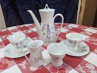 Full set view showing all six items on red and white checkered tablecloth