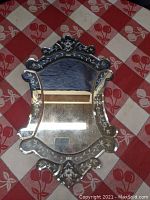 Full view of the vintage Vienna style mirror showing the intricate floral etched glass border and reflective surface.