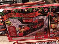 Photo of the front of the North Pole Express Christmas train set box showing the train picture and set branding.