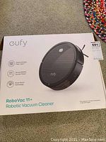 Sealed retail box showing Eufy RoboVac 11+ branding and product image