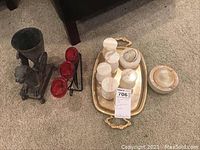Photo showing the banded onyx set on a gold tray with corresponding pieces, small candle holder, and lion head statue on carpeted floor.