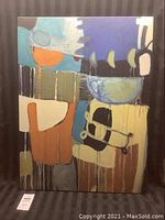 Full view of Garcia abstract canvas painting "Habits and Habitants I" showing geometric shapes and various colors including blue, orange, cream, and black. Painting is unframed and measures 32x24 inches.