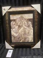 Full front view of framed 'Stoic Romance' artwork showing the frame and protective corner covers.