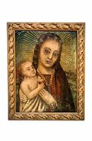 Front view of the Madonna and Child painting, showing religious iconography and decorative gilt wooden frame