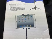 Photo of tablet tripod box showing compatibility with 7-10 inch tablets including iPad, Kindle, Nexus 7.