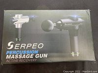 Box of Serpeo percussion massage gun showing exterior graphics and branding