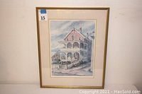 Framed hand-signed limited edition watercolor print showing a Victorian Pink House in Cape May, overall view.