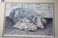 Close-up view of the print showing mother pig and piglets with signature and numbering 340/500 visible.