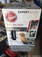 Box front showing Hoover Expert Series Spotless Pet formulation with image of dog and highlighting spot and stain removal features.