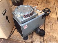 Pump and intake silencer next to original box