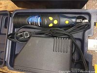 Mastercraft cordless rotary tool and charger inside a plastic carrying case