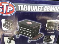 Photo showing front and side views of the STP tool cabinet stool, highlighting the cushioned drawers and the seat top with STP logo.