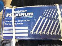 Box of Mastercraft Maximum Combination Wrench Set showing the set includes multiple wrenches and key product features: chrome vanadium steel, longer handle, full polish finish.