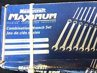 Close-up photo of the Mastercraft Maximum wrench set box showing brand, product line, and combination wrench set wording on a blue box with some wear.