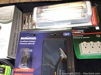 Mastercraft cordless cutters 3.6V in original packaging, showing front blister pack and charger, with other new items nearby