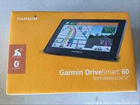 Front view of Garmin DriveSmart 60 box showing product image and branding