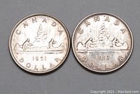 Both Canadian silver dollar coins showing the reverse with canoe design and year 1951 and 1937