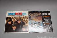 Photo showing the front covers of The Beatles vinyl albums: The Early Beatles and Something New side by side.