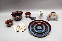 Full lot including chip and dip bowls, leaf dish, heart decor, double-spouted vase, and round nested serving tray.