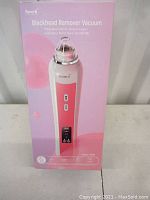 Photo of the blackhead remover vacuum packaging showing front with device image and brand information