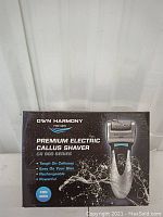 Front side of the Own Harmony premium electric callus shaver box showing product image and key features including being tough on calluses, easy on skin, rechargeable, and powerful. Indicates it is for men and part of CR 900 series.