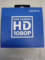 Front view of the PapaLook HD 1080p webcam box showing the branding and resolution specifications.