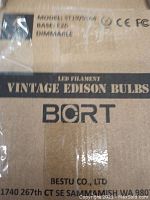 Packaging box label showing model S19/S164, base E26, dimmable features and BORT branding