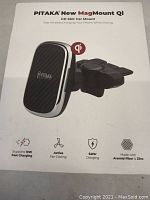 Box front of PITAKA New MagMount Qi showing product image and key features like 10W fast charging, fan cooling, safer charging, aramid fiber & zinc materials