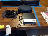 Bose headphones with case, AKG headphones, Steinberg UR22 MKII interface on table